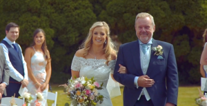 Bride walking with father down aisle Bride walking with father down aisle